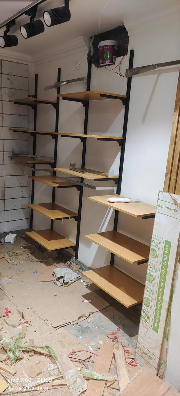 Wall channel with wooden shelves fitted in Delhi, Delhi NCR